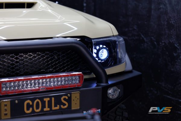 LC70/LC71/LC76/LC78/LC79 Black LED Headlights Coloured Halo + Demon Eyes Clear Lens